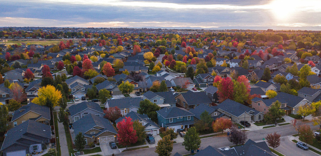 An aerial view of a neighborhood highlighting different outdoor house paint options