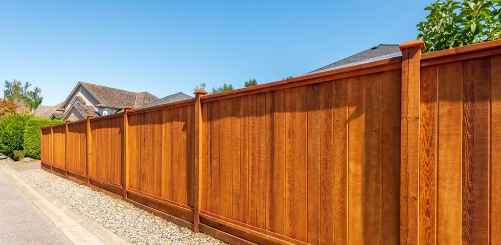 New wood fence with stain