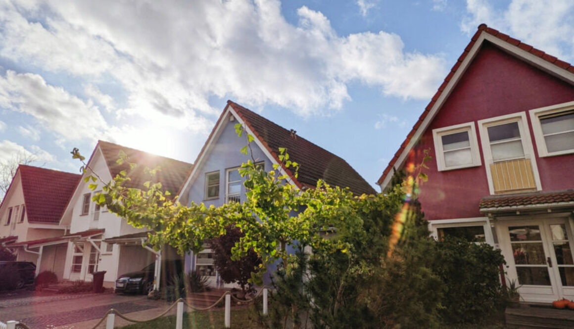 Houses in a neighborhood that are painted different colors