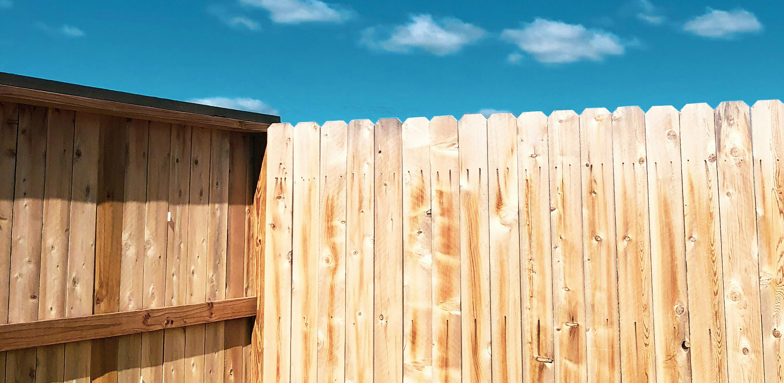 A fence that needs cleaned before staining