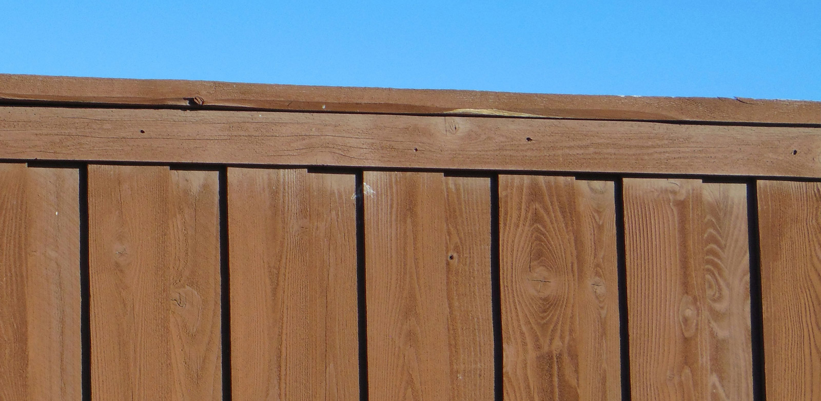 Wood fence with semi-solid stain, not paint